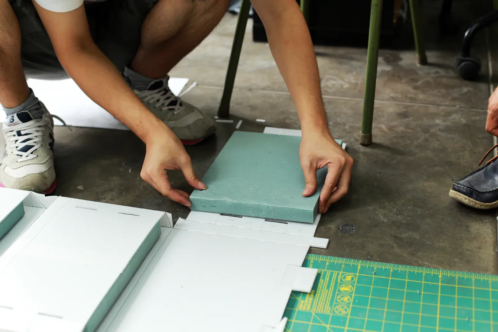 Fitting foam insulation panels into the shell