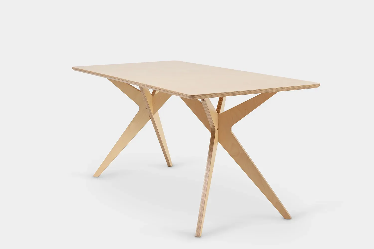 Plywood table on splayed, branching legs