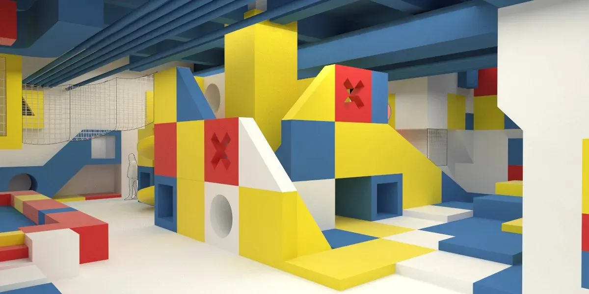 Rendering of stacked red, yellow, blue and white play blocks with cut-out cross and circle openings